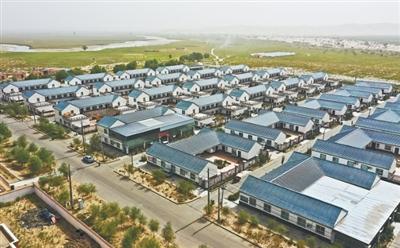 漂亮整洁的达里雅布依新村。阿不都拉·买买提明摄